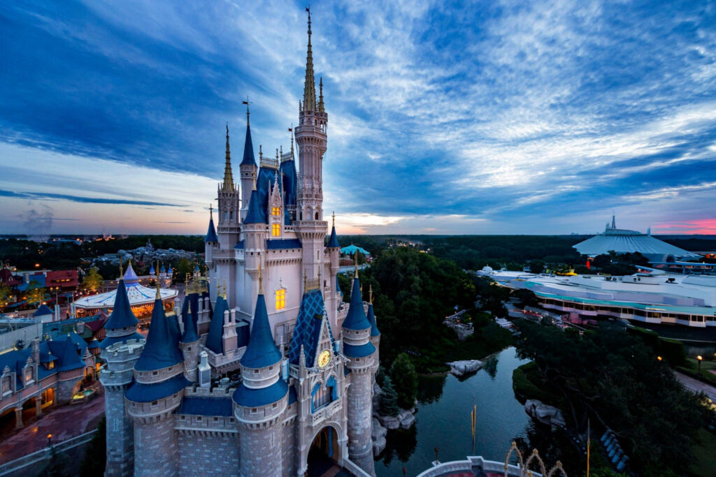 Cinderella castle at dusk at walt disney world, included in the cost of the trip.