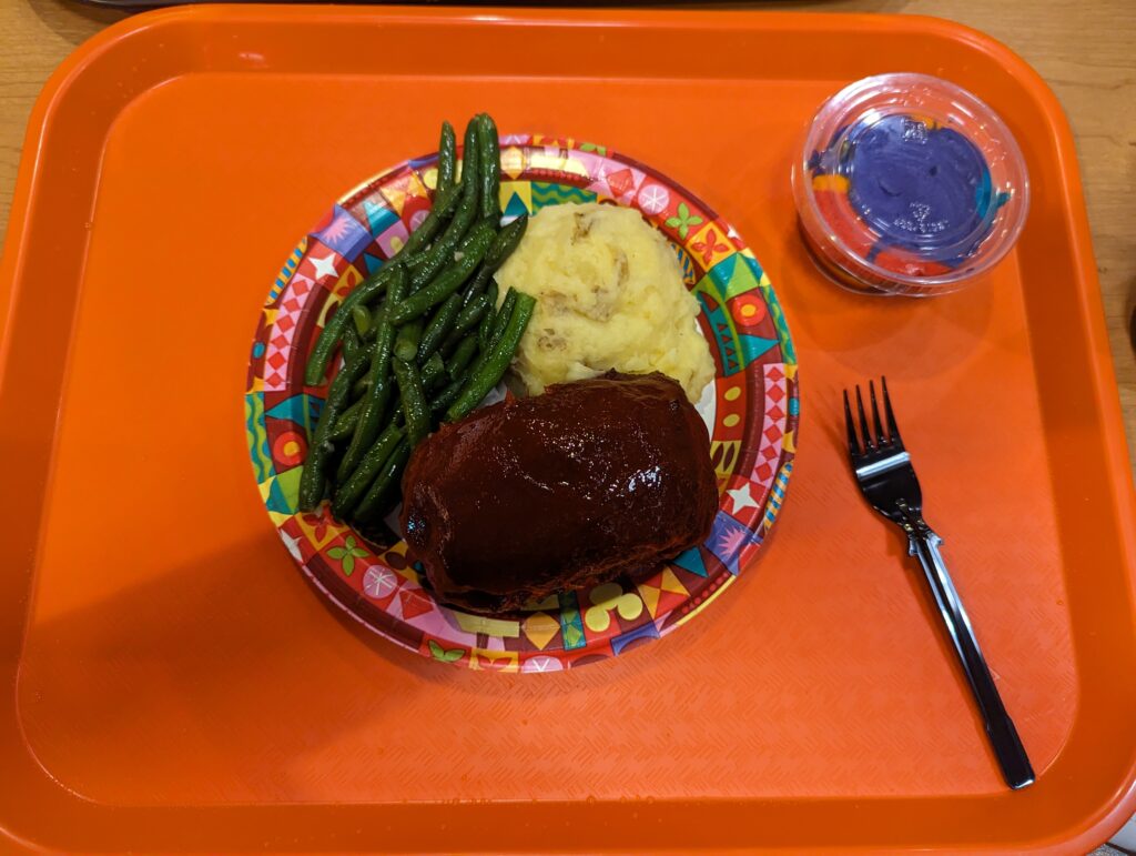 a plate of food on a tray